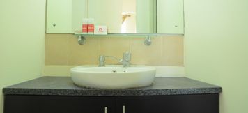 Toilet Kamar 6 Great Value 1BR at Apartment Taman Semanan Cengkareng By Travelio