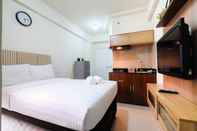 Bedroom Mall Access Studio at Green Pramuka City Apartment By Travelio