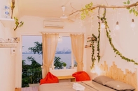 Phòng ngủ Manmo Nha Minh Homestay