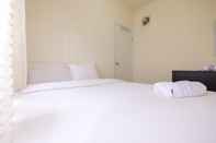 ห้องนอน Cozy & Modern 2BR at Green Pramuka City Apartment By Travelio