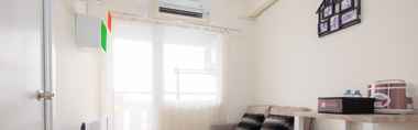 Lobi 2 Cozy & Modern 2BR at Green Pramuka City Apartment By Travelio