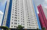 Bangunan 3 Cozy & Modern 2BR at Green Pramuka City Apartment By Travelio