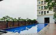 Kolam Renang 3 Comfy Studio Apartment at Tamansari Mahogany By Travelio