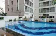 Swimming Pool 2 Studio Apartment near Universitas Indonesia at Taman Melati Margonda By Travelio