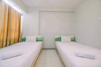 Bedroom 4 Studio Apartment near Universitas Indonesia at Taman Melati Margonda By Travelio