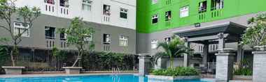 Lobi 2 Modern Design 2BR at Green Pramuka City Apartment By Travelio