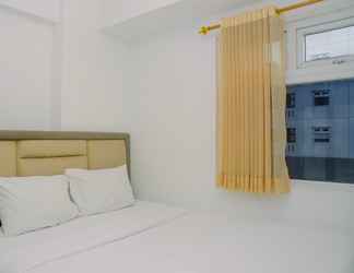 Bedroom 2 Modern Design 2BR at Green Pramuka City Apartment By Travelio