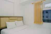 Bedroom Modern Design 2BR at Green Pramuka City Apartment By Travelio