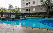 Swimming Pool 3 Modern Design 2BR at Green Pramuka City Apartment By Travelio