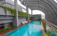 Swimming Pool 6 Elegant Design 2BR at L'Avenue Apartment By Travelio