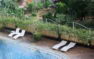 Swimming Pool 4 Roomy 2BR Belmont Residence Apartment near Puri By Travelio