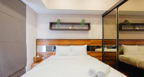 Bedroom 2 Luxurious Studio at Casa De Parco Apartment By Travelio