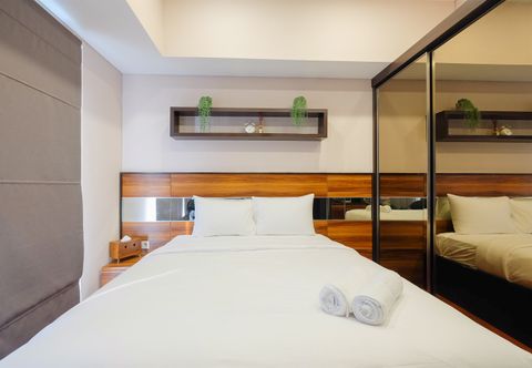 Bedroom Luxurious Studio at Casa De Parco Apartment By Travelio