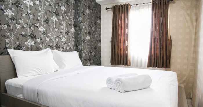 Bilik Tidur Homey and Classic 1BR @ Mutiara Bekasi Apartment By Travelio