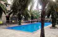 Swimming Pool 6 Homey and Classic 1BR @ Mutiara Bekasi Apartment By Travelio