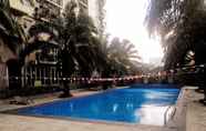 Swimming Pool 4 Homey and Classic 1BR @ Mutiara Bekasi Apartment By Travelio