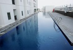 Swimming Pool 3 1BR Apartment at Northland Ancol Residence By Travelio
