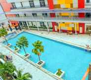 Swimming Pool 4 Near Pejaten Village 1BR Gardenia Boulevard Apartment By Travelio