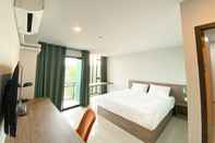 ห้องนอน Dee Hotel Phayao