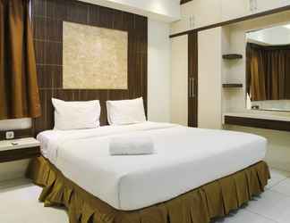 Bedroom 2 3BR with City View at Sudirman Condominium Apartment by Travelio