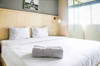 ห้องนอน Cozy and Modern Studio Room @ Oasis Apartment By Travelio