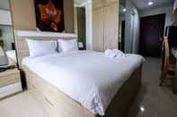 ห้องนอน Especial Studio Apartment Springwood Residence By Travelio