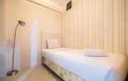Bedroom 2 Comfy 2BR near Bassura Mall at Bassura City Apartment By Travelio