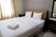 Bedroom Enjoyable 2BR Apartment at Mediterania Marina Residence By Travelio