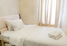 Bedroom 2 Enjoyable 2BR Apartment at Mediterania Marina Residence By Travelio
