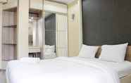 Bedroom 2 Minimalist and Cozy Studio Apartment at Gateway Ahmad Yani By Travelio