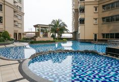スイミングプール 4 Minimalist & Cozy 1BR Apartment at Mediterania Marina Residence By Travelio