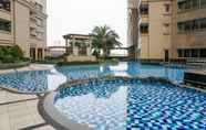 Swimming Pool 4 Minimalist & Cozy 1BR Apartment at Mediterania Marina Residence By Travelio