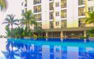 Swimming Pool 2 Simple & Cozy Studio Apartment at Cinere Resort By Travelio