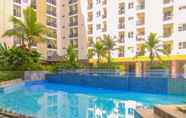 Swimming Pool 4 Simple & Cozy Studio Apartment at Cinere Resort By Travelio