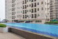 Swimming Pool Modern Furnished Studio at Ayodhya Residence Apartment By Travelio