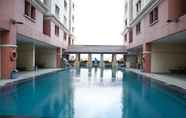 Kolam Renang 3 Simply Design 2BR Gajah Mada Mediterania Apartment By Travelio
