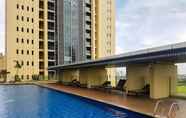 Swimming Pool 3 Deluxe 2BR at The Branz Apartment near AEON Mall By Travelio