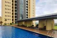 Swimming Pool Deluxe 2BR at The Branz Apartment near AEON Mall By Travelio