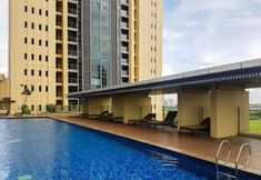 Swimming Pool 3 Deluxe 2BR at The Branz Apartment near AEON Mall By Travelio