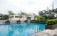 Kolam Renang 5 Cozy and Big 2BR Apartment at Aspen Residence By Travelio 