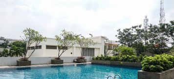 Swimming Pool 5 Cozy and Big 2BR Apartment at Aspen Residence By Travelio 