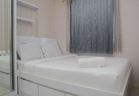 ห้องนอน Clean & Comfortable 2BR Green Pramuka Apartment By Travelio