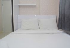ห้องนอน 2 Clean & Comfortable 2BR Green Pramuka Apartment By Travelio