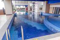 Kolam Renang Fully Furnished 3BR Apartment at Mangga Dua Residences By Travelio