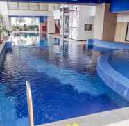 Swimming Pool 2 Fully Furnished 3BR Apartment at Mangga Dua Residences By Travelio