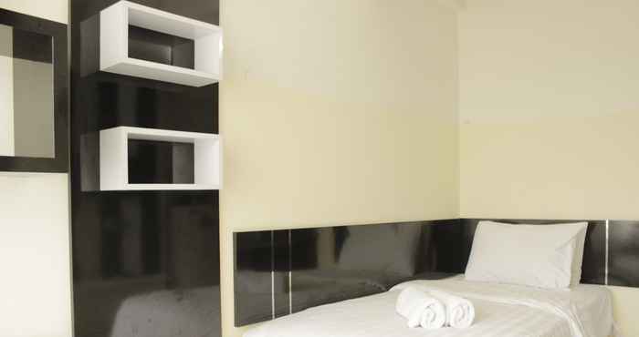 Kamar Tidur Comfortable Studio Room Apartment at Stanford Jatinangor By Travelio