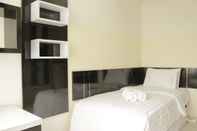 Kamar Tidur Comfortable Studio Room Apartment at Stanford Jatinangor By Travelio