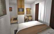 Kamar Tidur 4 Hotel Daily Inn Bandung