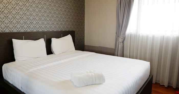 Kamar Tidur 1BR Apartment The Wave Kuningan near Epicentrum By Travelio