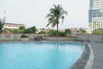 Swimming Pool 4 Modern 1BR at Margonda Residence 1 Apartment By Travelio